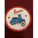 A CAST METAL "VESPA SCOOTER" CIRCULAR SIGN