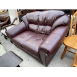 A MODERN BROWN LEATHER TWO SEATER SETTEE