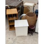 AN ASSORTMENT OF ITEMS TO INCLUDE A REVOLVING SHELF UNIT, WHICKER BASKET AND TWO MIRRORS ETC