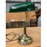 A BRASS BANKERS LAMP WITH GREEN SHADE