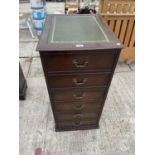 A MODERN THREE DRAWER MAHOGANY FILING CABINET WITH INSET LEATHER TOP IN THE FORM OF A CHEST OF