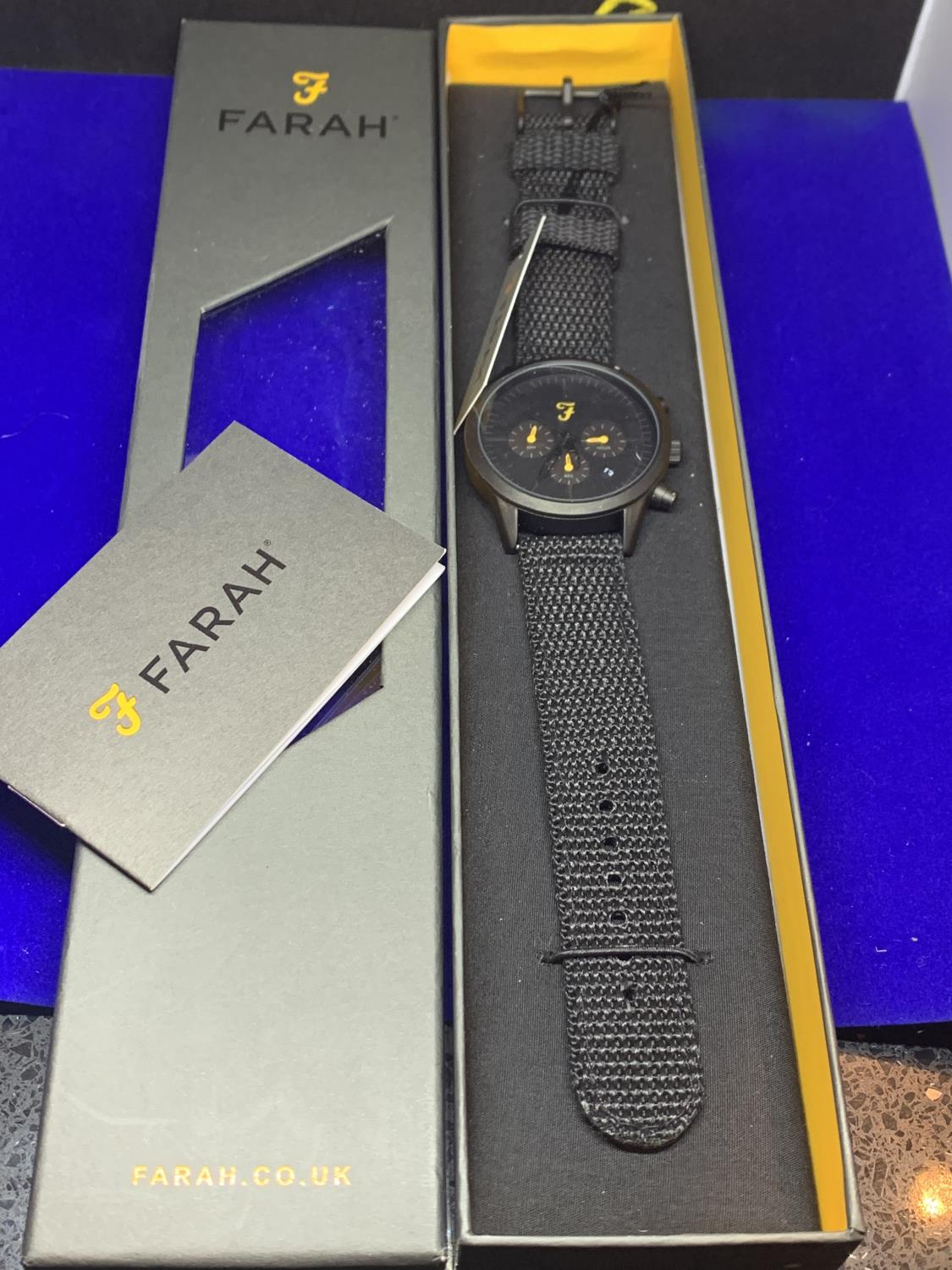 A GENTS FARAH WRIST WATCH NEW AND BOXED IN WORKING ORDER