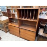 A RETRO TEAK LOUNGE UNIT WITH OPEN SHELVES, CUPBAORDS AND PIGEONHOLES, 60" WIDE