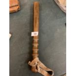 A WOODEN POLICEMAN'S TRUNCHEON