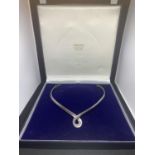 A CHOKER STYLE NECKLACE WITH TWIST DESIGN MARKED 925 IN A PRESENTATION BOX