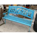 A BLUE GARDEN BENCH WITH CAST BENCH ENDS AND FLORAL DETAIL
