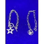 TWO SILVER BRACELETS MARKED 925 TO INCLUDE A STAR DESIGN