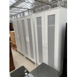 THREE MODERN WHITE TWO DOOR WARDROBES, 32" WIDE EACH