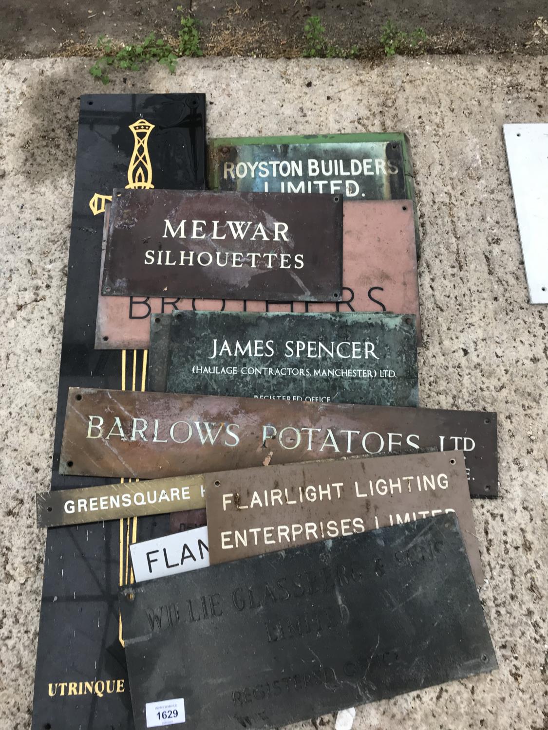 AN ASSORTMENT OF HISTORICAL METAL ENGRAVED COMPANY SIGNS
