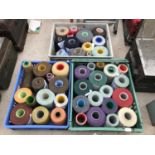 A LARGE QUANTITY OF SEWING YARN IN VARIOUS COLOURS