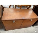 A RETRO TEAK TWO DOOR CUPBOARD, 36" WIDE