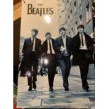 A TIN METAL GARAGE/ MAN CAVE SIGN 'THE BEATLES'