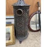 A VINTAGE CAST IRON HEATER