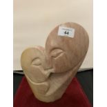 AN ABSTRACT MARBLE BUST OF TWO LOVERS - HEIGHT 25CMS
