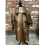 A THREE QUARTER LENGTH FUR COAT