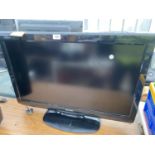 A 32" SHARP AQUOS TELEVISION BELIEVED IN WORKING ORDER BUT NO WARRANTY