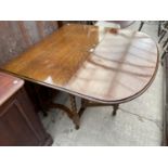 AN EARLY 20TH CENTURY OAK GATE LEG DINING TABLE ON BARLEY TWIST SUPPORTS