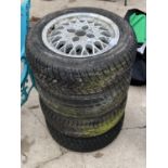 FOUR FORD RIMS WITH RADIAL TYRES