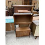 A RETRO TEAK EFFECT AND METAL FRAMED BOOKCASE