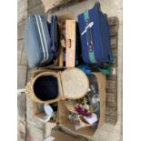 AN ASSORTMENT OF HOUSEHOLD CLEARENCE ITEMS TO INCLUDE GLASS WARE, A LAUNDRY BASKET AND SUITCASES