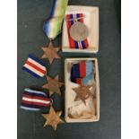 FOUR LATE ISSUE WORLD WAR II MEDALS