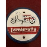 A CAST METAL "LAMBRETTA" CIRCULAR SIGN