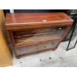 A GLOBE WERNICKE MAHOGANY BOOKCASE WITH TWO UP AND OVER DOORS (ONE REQUIRES RE-GLAZING)