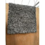 A GREY RUG