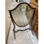 AN EDWARDIAN MAHOGANY AND INLAID SHIELD SHAPED SWING FRAME VANITY MIRROR