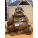 A LARGE CARVED WOODEN BUDDHA