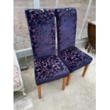 A PAIR OF MODERN PURPLE FLORAL HIGH BACKED DINING CHAIRS