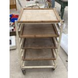 A VINTAGE POTTERS TROLLEY WITH FOUR SHELVES