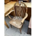 AN ELM AND BEECH WHEELBACK WINDSOR STYLE ELBOW CHAIR