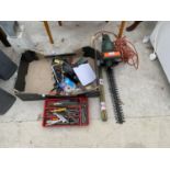 AN ASSORTMENT OIF TOOLS TO INCLUDE AN ELECTRIC HEDGE CUTTER AND SPANNERS ETC