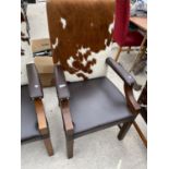 A LEATHER AND COWHIDE ARMCHAIR