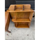 A STAINED WOODEN OPEN BOOKCASE