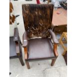 A LEATHER AND COWHIDE ARMCHAIR
