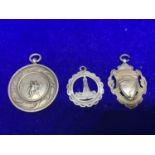 THREE HALLMARKED SILVER ALBERT FOBS TO INCLUDE A 1930 CHARLTON CUP