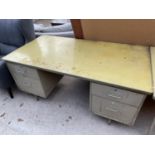 A MID 20TH CENTURY DOUBLE PEDESTAL METAL DESK, 63x33"