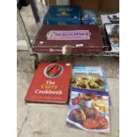 AN ASSORTMENT OF BOARD GAMES AND COOK BOOKS