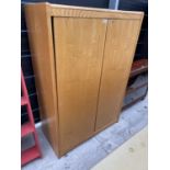 AN OAK OFFICE CABINET WITH TWO DOORS