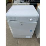 A WHITE INDESIT 7KG WASHING MACHINE BELIEVED IN WORKING ORDER BUT NO WARRANTY