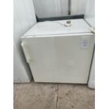 A WHITE ELECTROLUX COUNTER TOP FRIDGE BELIEVED IN WORKING ORDER BUT NO WARRANTY