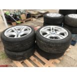 A SET OF FOUR BMW RIMS WITH 255/40 R18 TYRES