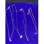 FOUR VARIOUS SILVER NECKLACES