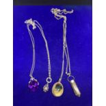 FOUR SILVER NECKLACES WITH PENDANTS