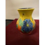 AN ANITA HARRIS HAND PAINTED AND SIGNED BLUE FLOWERS VASE