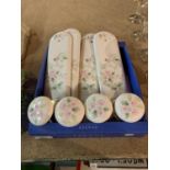 A COLLECTION OF CERAMIC DOOR KNOBS AND FINGER PLATES