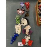 A SELECTION OF VERY UNUSUAL RESIN BROOCHES IN THE FORM OF FOXES , CATS ETC