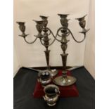 A PAIR OF SILVER PLATED THREE BRANCH CANDELABRAS AND A PAIR OF SMALL URN SHAPED VASES